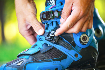 Roller adjusting buckle on inline roller skates.
