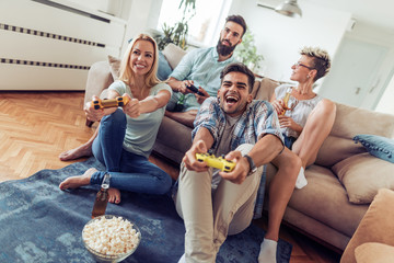 Friends playing video game