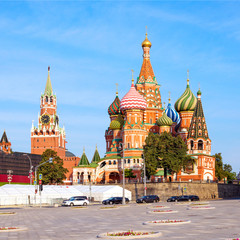 Saint Basil's Cathedral in Red Square and Kremlin tower in Mosco