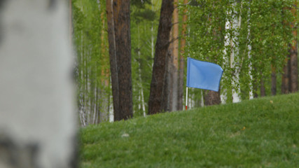 Blue flag waving over the sky. Blue flag waving on the wind