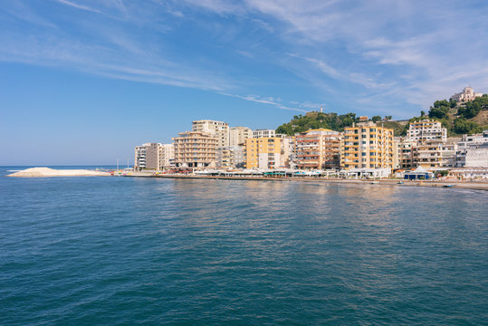  The city of Durres is located on the Adriatic coast. Residential complexes are located along the coastline.