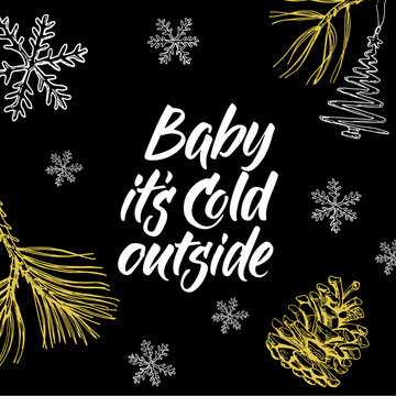 Baby it's cold outside! Hand written lettering and christmas doodle on black background.