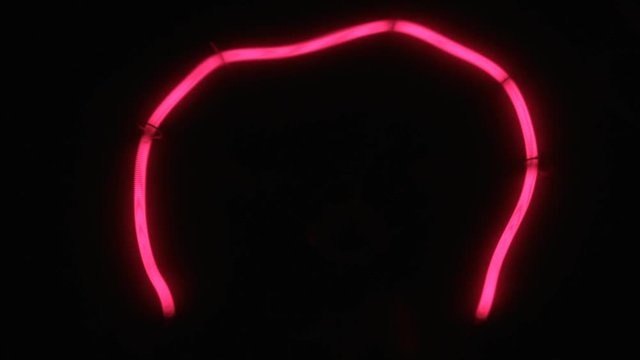 Close-up of a red tungsten filament. Smooth increase and decrease in power.