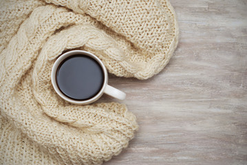 Christmas decor: warm sweater, cup of hot coffee. Winter mood, holiday background.
