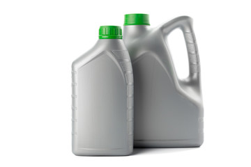Plastic bottles from automobile oils isolated on white