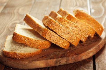 Freshly baked bread on wooden table
