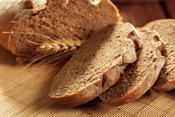 Freshly baked bread on wooden table