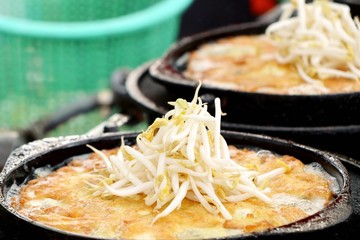 Crispy fried mussels with egg