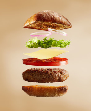 Exploded view of burger, buns and ingredients