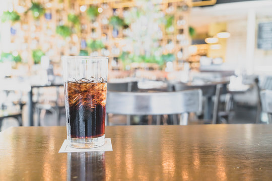 a glass of cola in restaurant