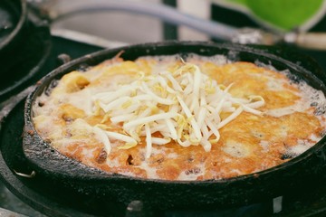 Crispy fried mussels with egg