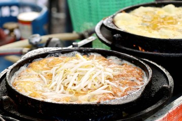 Crispy fried mussels with egg