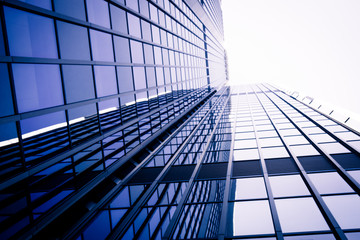 Obraz na płótnie Canvas modern business skyscrapers. Office building close up. modern glass wall