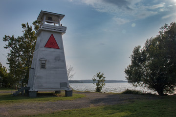 White lighthouse bell-tower on a sunny day