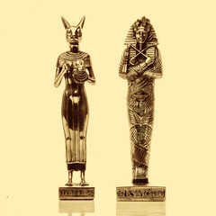 Egyptian cats and pharaon on a white background. Egyptian pharaoh Statue - obrazy, fototapety, plakaty