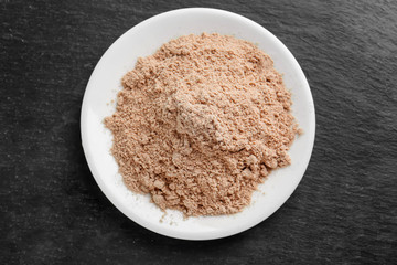 Chia seed powder on color background