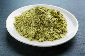Hemp protein powder on color background