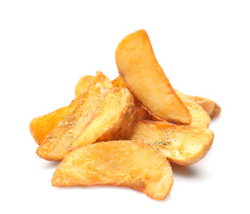 Delicious baked potato wedges on white background