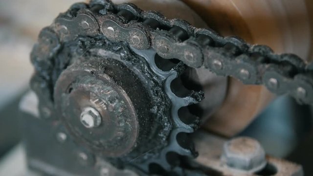 Close up view of rotated chain gear - part of industrial machinery - manufacturing
