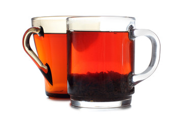 Glass cup with tea on white background