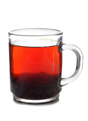 Glass cup with tea on white background