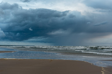 Fototapeta na wymiar Stormy evening by Baltic sea, Liepaja, Latvia.