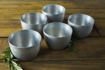 Plastic bowls and rosemary herb