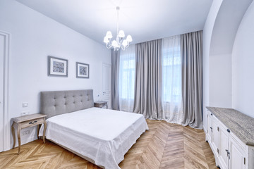 Modern interior of a bedroom in the new house.