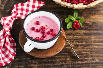 Traditional seasonal dessert. Homemade whipped dessert based on semolina, cranberries and cranberry...