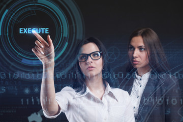 The concept of business, technology, the Internet and the network. A young entrepreneur working on a virtual screen of the future and sees the inscription: Execute