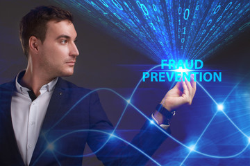 Business, Technology, Internet and network concept. Young businessman working on a virtual screen of the future and sees the inscription: Fraud prevention