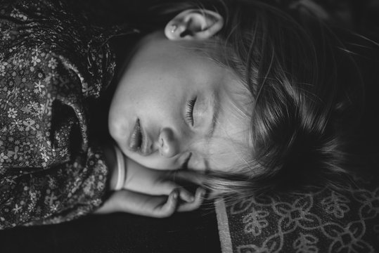 Cute little girl sleeping,  in black and white