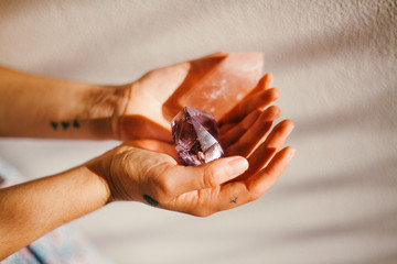 Woman's hands holding crystals