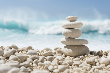 Balanced stones on a pebble beach