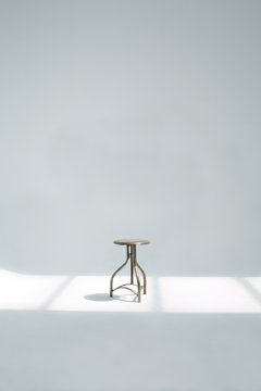 One metallic and adjustable stool in the studio
