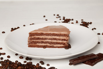 Sweat cake with chocolate on plate on wooden background