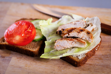 Cooking homemade grilled chicken sandwich