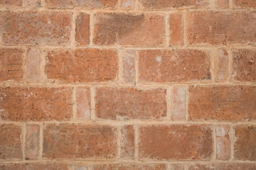 Brick wall with modern bonding, Brick linkage in height, Matt firebrick background, Contemporary brick bond, Raw brick wall texture, Surface in wine cellar, Modern raw floor, Vertical construction