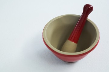 Mortar and pestle on white background