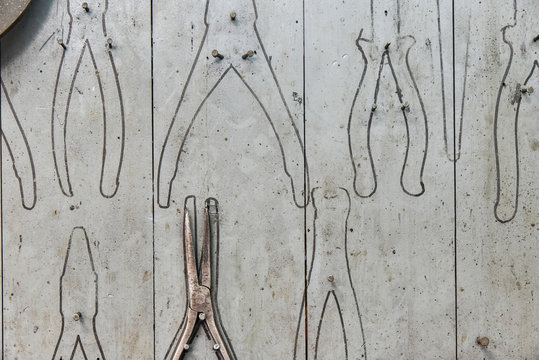 Pliers hanging on a workshop