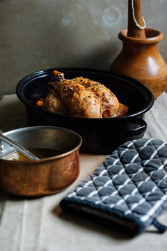 Roast chicken in a roasting tin.