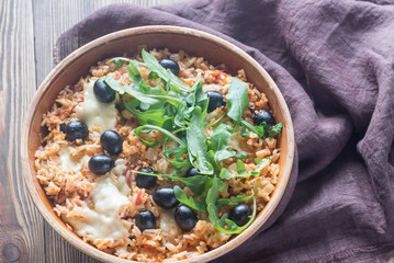 Bowl of tomato, olive and mozzarella rice