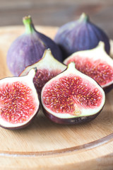 Ripe figs on the wooden board