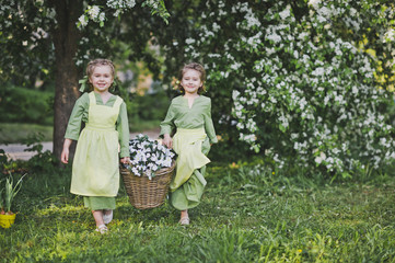 Girlfriend carried a wicker basket with flowers for garden decoration 8311.