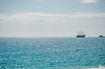 The blue sea with a big ship on the horizon 8360.