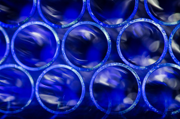 Abstract: Wall of Blurred  Blue Circles Forming Systematical Pattern