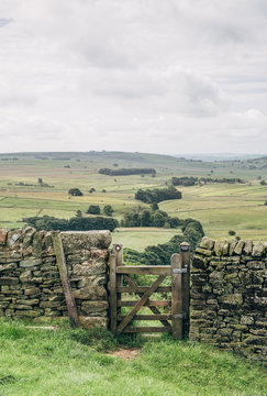 Gate in a wall leading to the next valley. Derbyshire, UK.