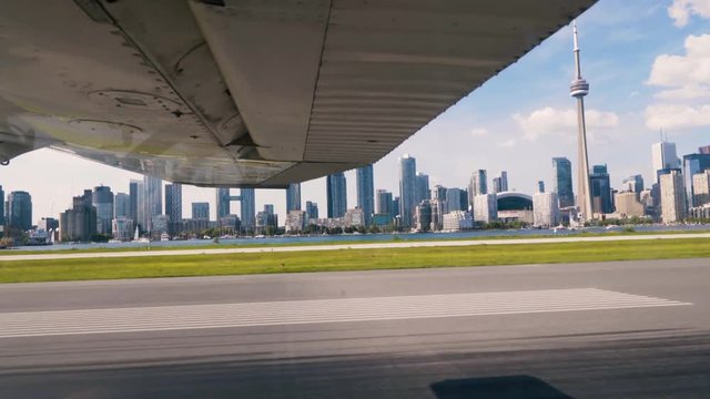 Point of View from Airplane Window ot Takeoff  at Billy Bishop Airport in Toronto