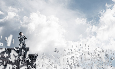 Obraz premium Young man on building edge do not want to see anything