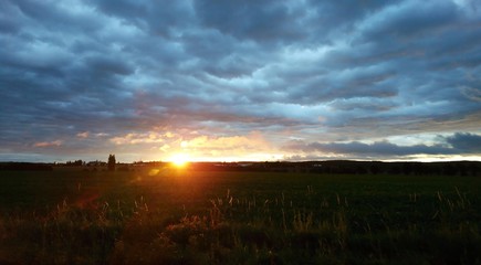 Beautiful late summer sunrise over a rural country.